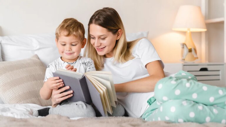 boy mom reading book