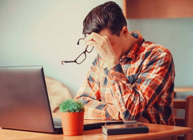 tired man at laptop istock medium