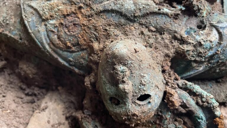 two mask like human faces