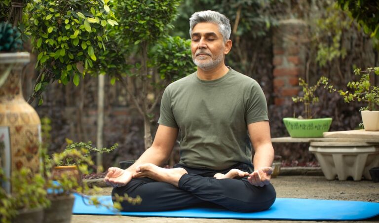 older man meditating